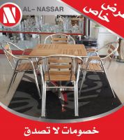 طاوله مع اربع كراسي