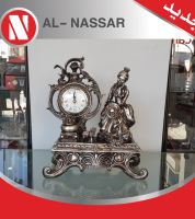 انتيكا على شكل بنت و ساعة 