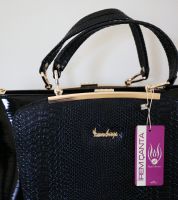 حقيبة يد جلد لميع - اسود