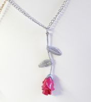 تعليقة وعقد على شكل وردة 