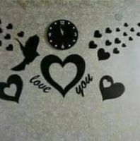 ساعه خشبية على شكل قلب