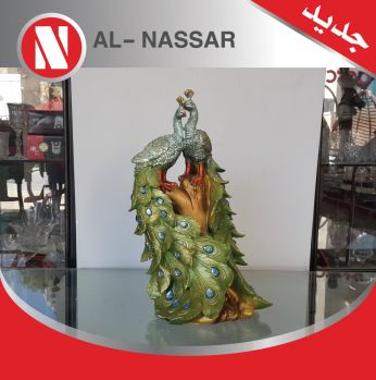 انتيكا على شكل طاووسان 