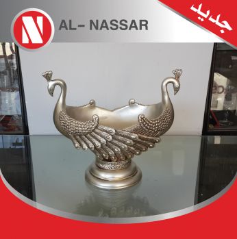 انتيكا على شكل بطتان 