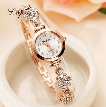 ساعة معدن ذهبي  Elegant Alloy