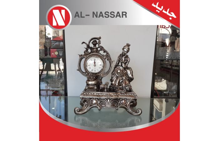 انتيكا على شكل بنت و ساعة 